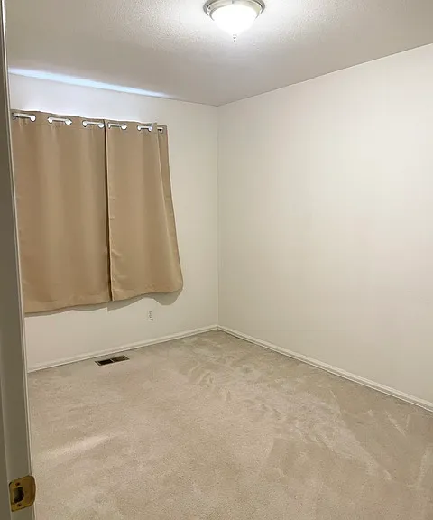 2nd and 3rd bedroom with new blackout curtains