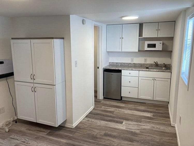 (The small fridge has been replaced with a larger one)