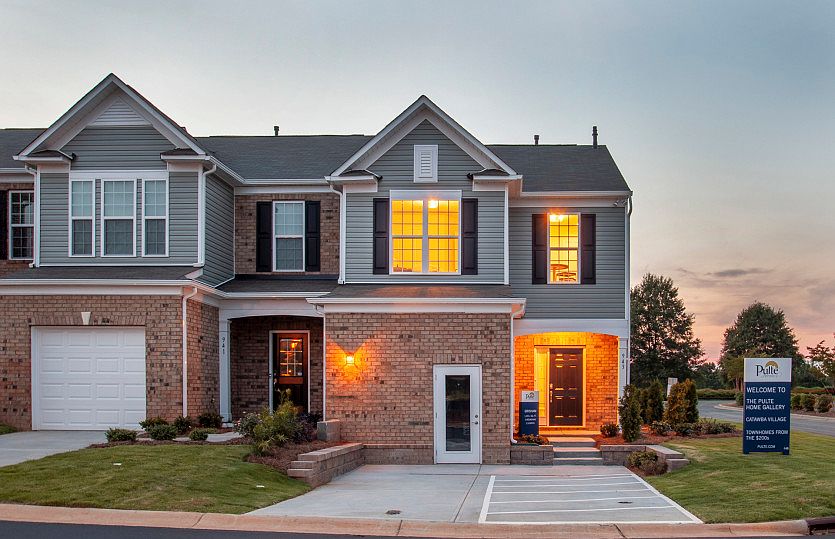 Grisham Exterior 5 features brick, siding, covered front door and 1 car garage