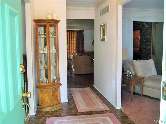 Enter the home and the dining room is on your left, main family room ahead, and living room to the right.