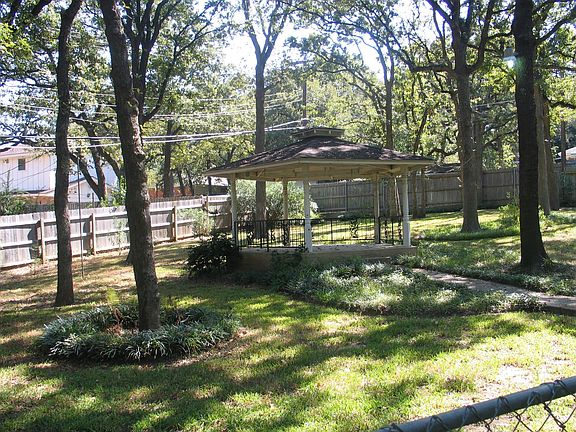 Gazebo in wooded back yard