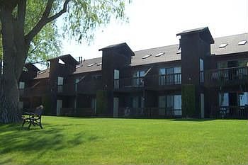 The relaxed atmosphere of natural beauty and four seasons of fun, make Harbor Pines the welcomed getaway! Spectacular sunsets and panoramic views of the Lighthouse and Harbor. Owners have updated with new carpeting, stone gas-log fireplace and more. All furnishings down to the silverware will stay including a queen-size sofa bed. As the seasons unfold, your Harbor Pines condominium will provide year around enjoyment, and relaxation in a country community with a unique unhurried