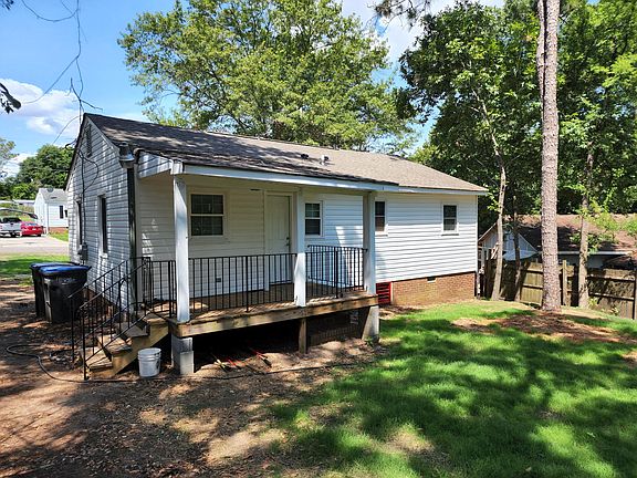 Rear of house/back porch from backyard