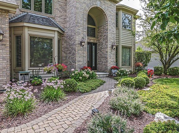 Newer Upgraded walkway that is beautifully landscaped.