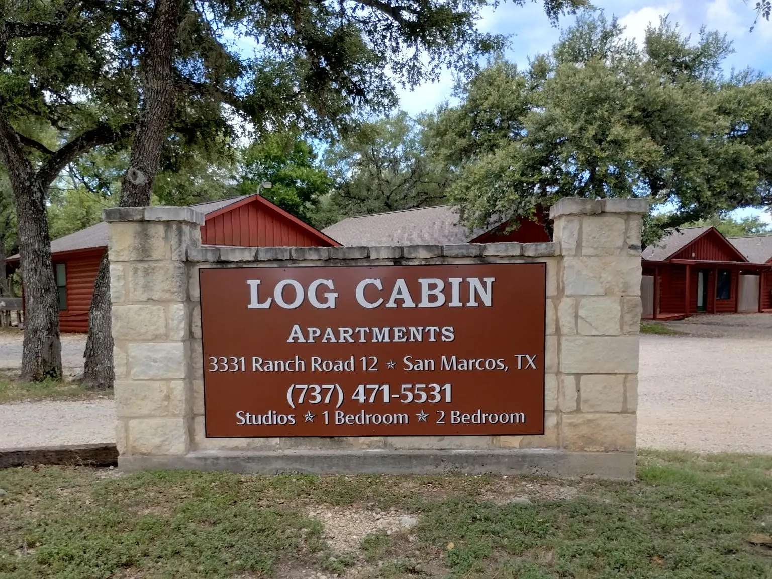 Log Cabin Plaza Apartments — Photo 1