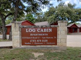 Log Cabin Plaza Apartments