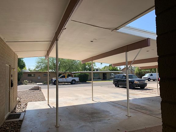 View from front entry, covered parking spot is on the right side