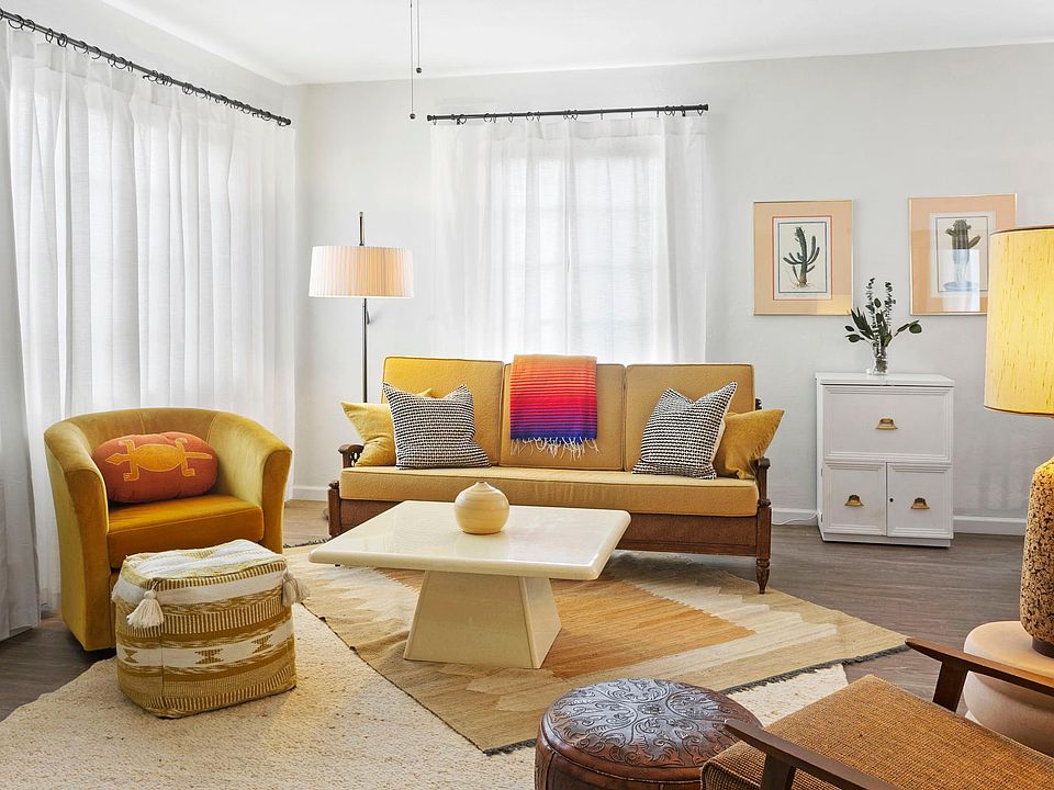 Enter into the sunny and bright living room of this historic home