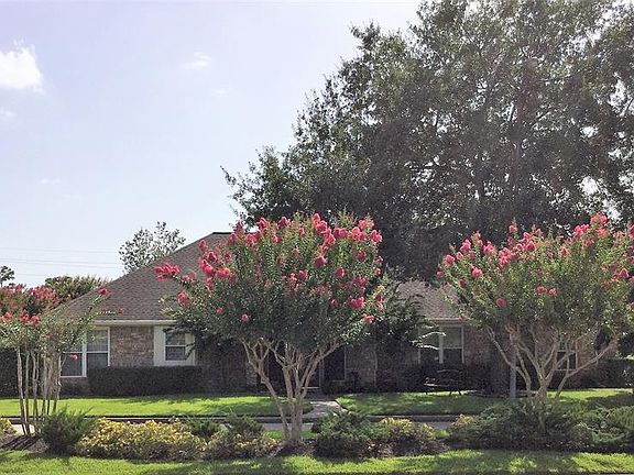 Front of home from the street as you turn into subdivision