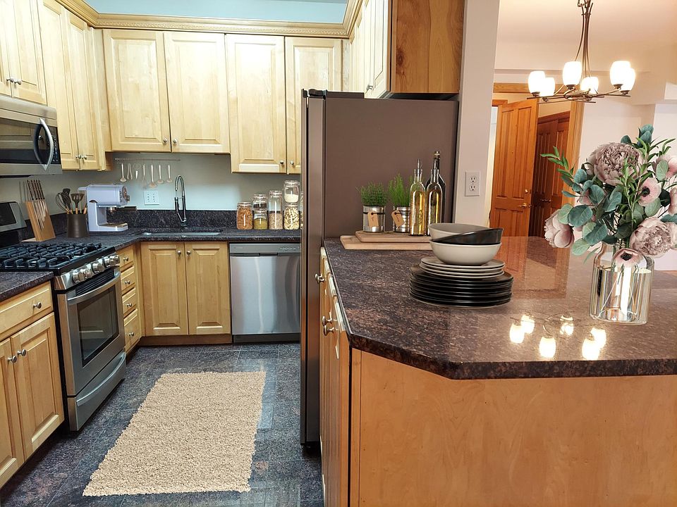 Kitchen Skylight! with large Island
Granite Countertops Newer 
Stainless Steel Appliances, Ample Cabinets & Pantry. Pull out shelves!