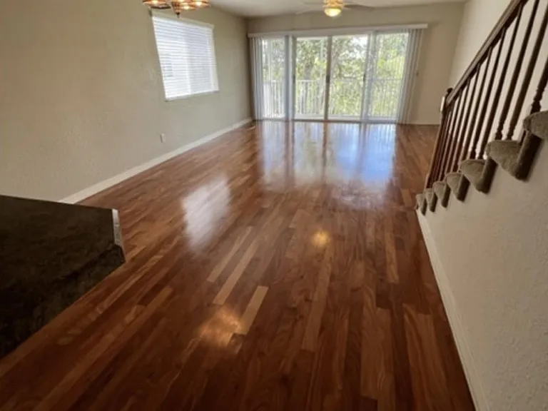 Dinning and Living over Brazilian Cherrywood floors leads to spacious waterfront balcony