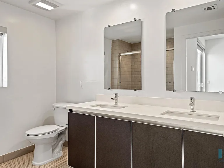 Bathroom with Double-Sink Vanity and Cabinet Storage