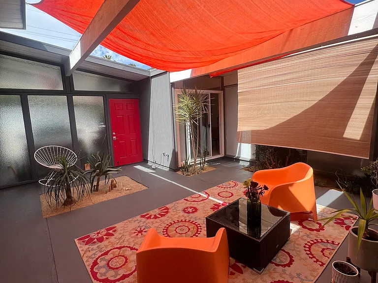 Step into the tranquil atrium, a serene sanctuary perfect for getting lost in a good book