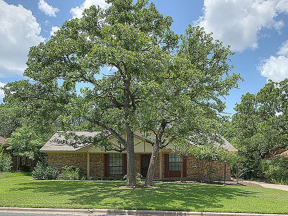 This beautiful 3 bedroom, 2 bath home offers a convenient location, large yard, and mature trees.