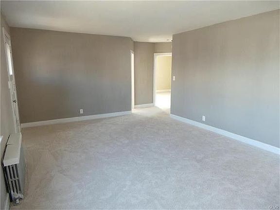 Living Room Looking at Bedrooms and Bathroom