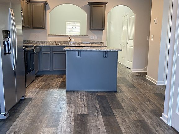Granite Kitchen with Laminate flooring File Photo