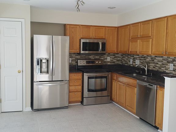 Modern kitchen with newer Stainless steel appliances