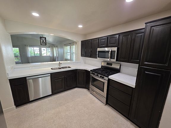 Remodeled kitchen with stainless steel appliances