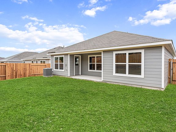 The back yard of the Blanco is fully fenced.