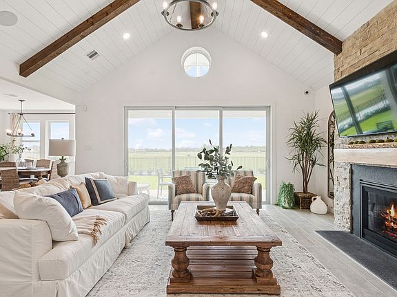 Great room with 12 multi-slide door to covered patio