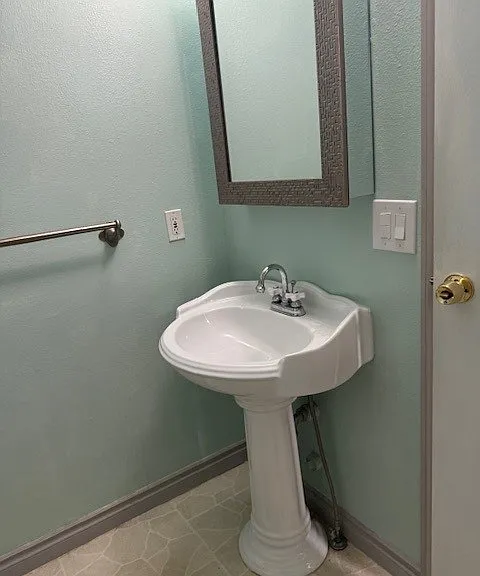Bathroom with large medicine cabinet.