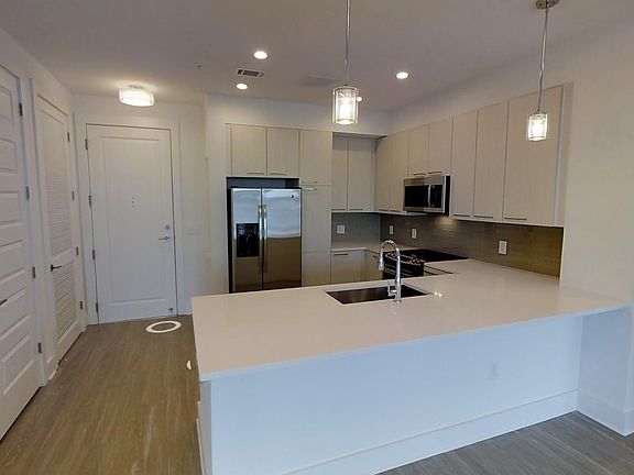 3rd image of 1030 E Paces Ln NE Penthouse 1