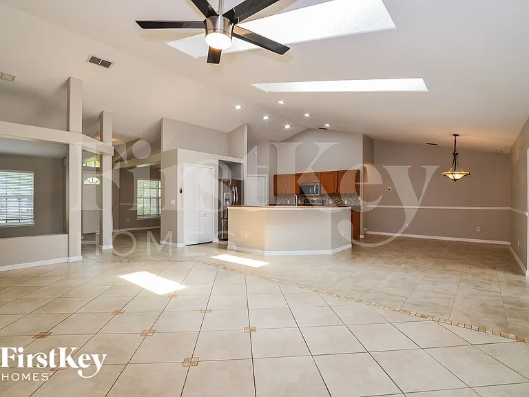 13219 Lakewind Dr — Photo 3