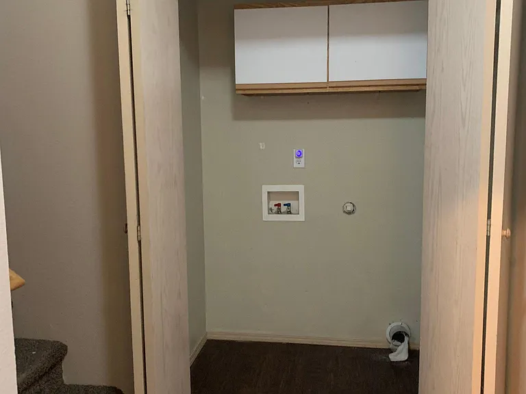 Laundry closet on bottom floor - W/D Hook up. New flooring just installed.