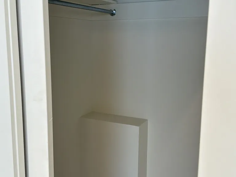 Walk Through Closet between front Bedroom and Full Bath