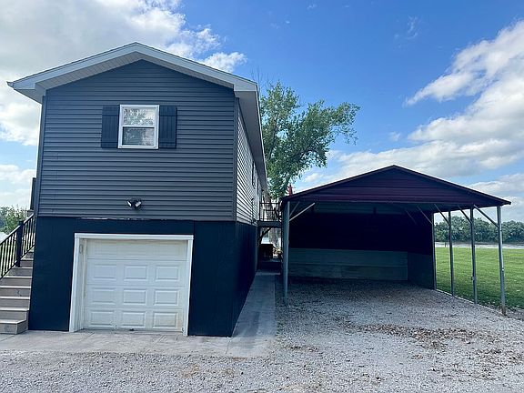 Garage and 2 car carport