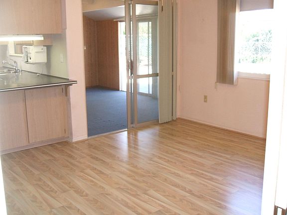 FAMILY ROOM/DINING ROOM W/PERGO FLOORS