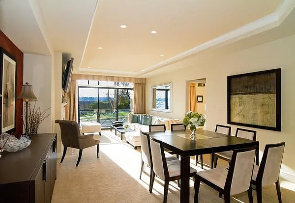 View of dining room and living room (lots of light, West facing)