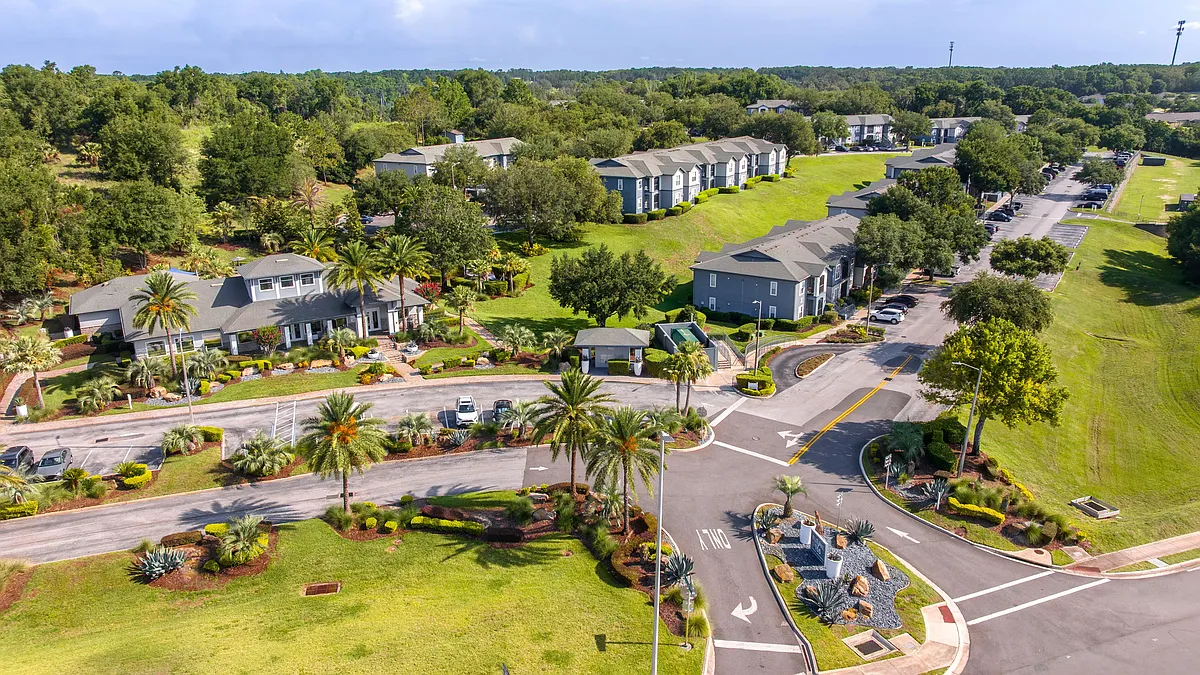 Discover the beautifully landscaped community of Elevate 155. With scenic views, modern architecture, lush green spaces, and natural beauty in a prime Mount Dora location. - Elevate 155