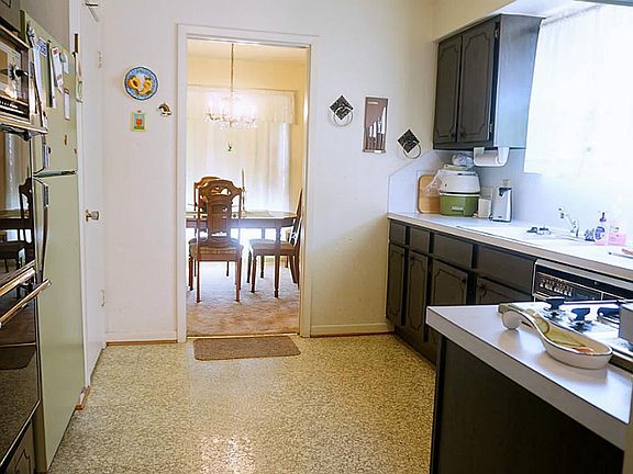 Kitchen has built-in appliances. Seller turned off the gas to the dbl. ovens, so we are not sure about the working condition