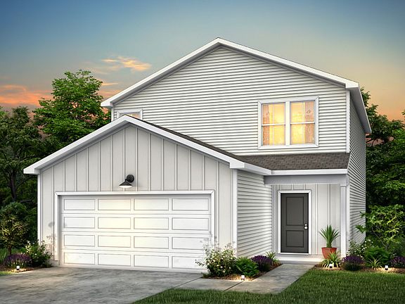 Raven Exterior TD102 features siding, covered front door and 2 car garage