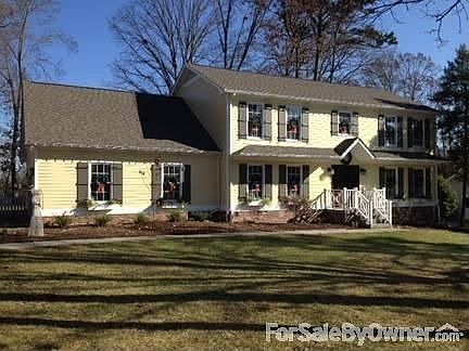FRONT
						:
						NEW HARDIEBOARD SIDING, PAINT, RAILING AND SHUTTERS. 2 YEAR OLD ROOF