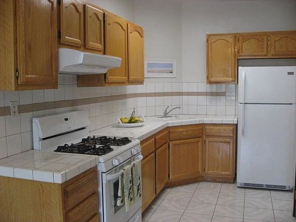 brand new appliances, enclosed laundry & and skylight