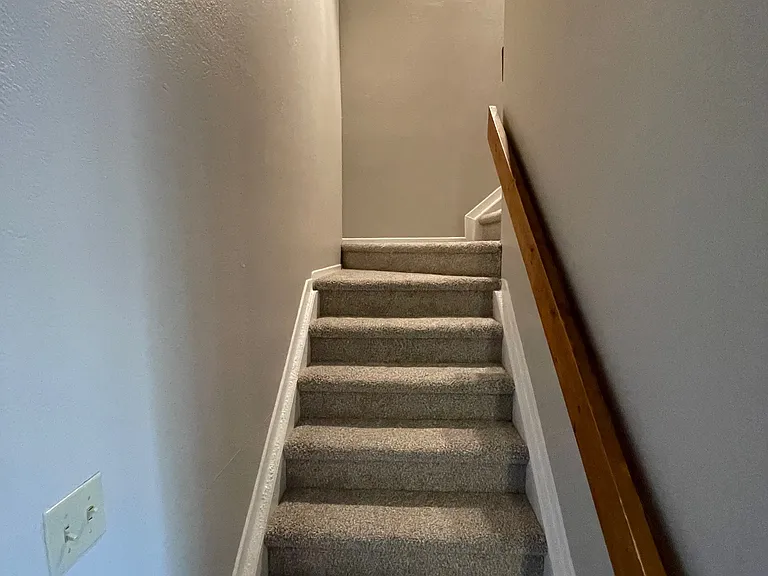 Head upstairs to the two bedrooms.