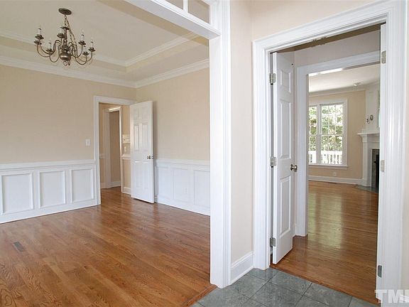 Entry Foyer opens to the Formal Dining and the Family Room through Double Doors that can be closed o
