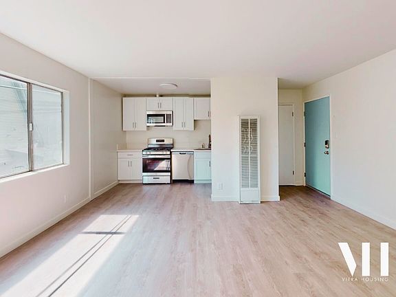 Apt 205 | One Bedroom | Fully Remodeled Interior, Hardwood throughout, Custom kitchen, stainless appliances, gas range, full size refrigerator, great floor plan!