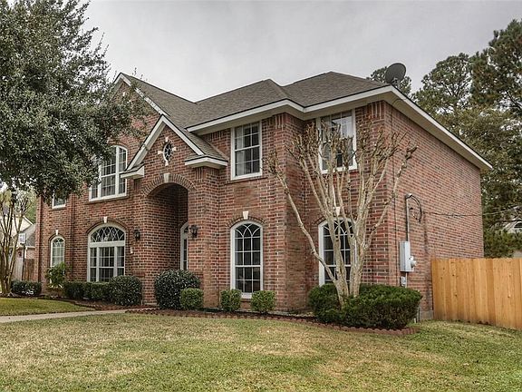 Fantastic 4 bedroom home with brick on all sides! This home includes fresh paint, new carpet, new wood flooring, granite counter tops, SS appliances, and open kitchen overlooking beautiful stone fireplace. Huge backyard! Did NOT flood during Harvey! 