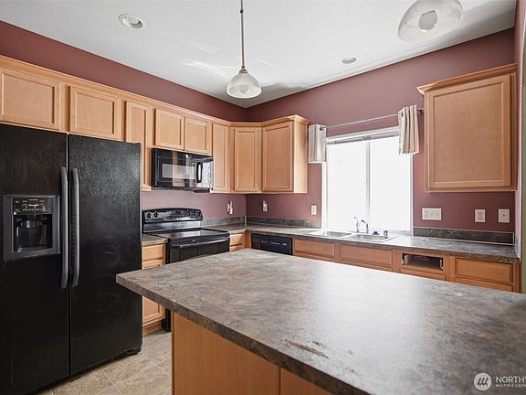 4th image of 8714 Oslo Lane NE