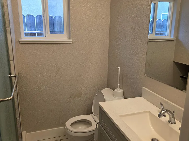 UPDATED HALL BATH WITH TILED SHOWER