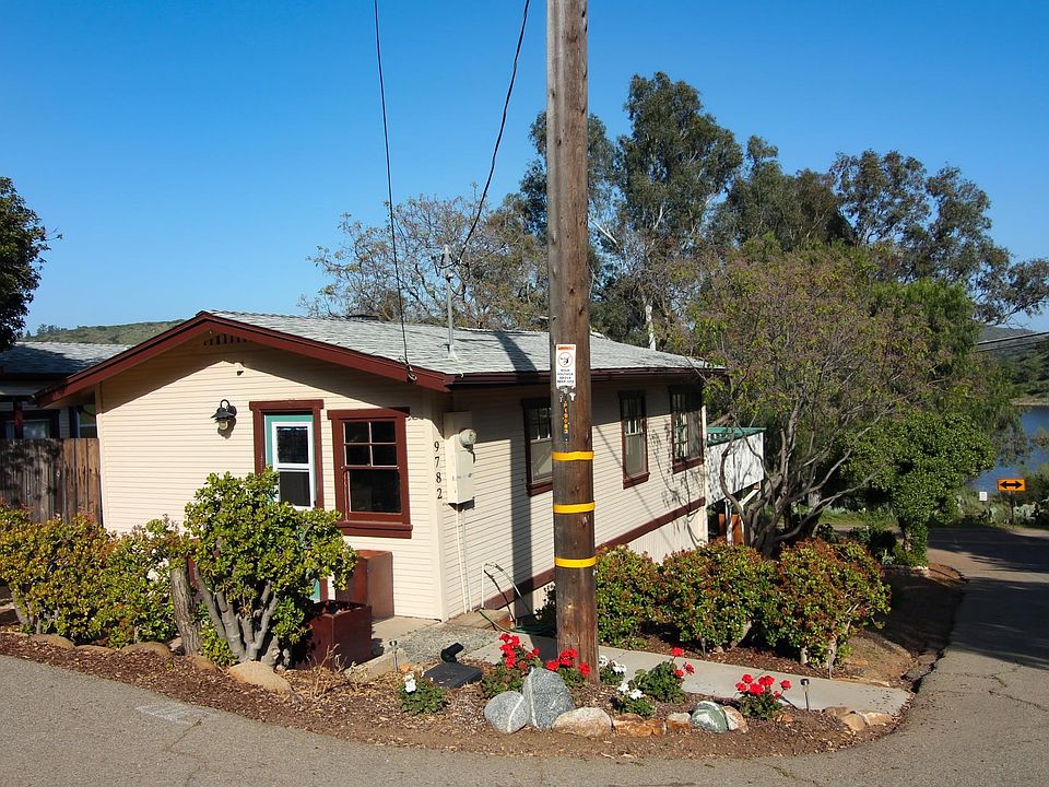 Home sits on the Corner Of Lake Drive and Quince Lane.