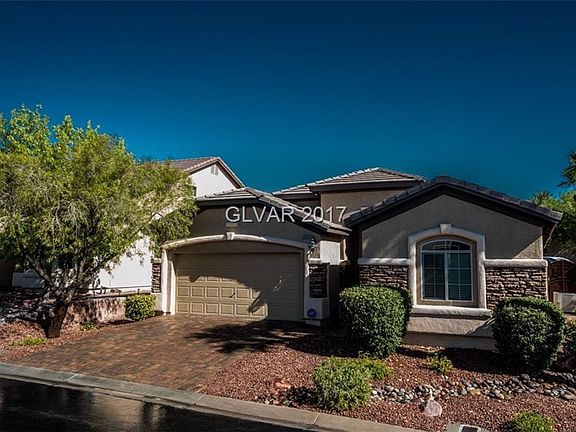 Upgraded front elevation with hip roof line and stone facia