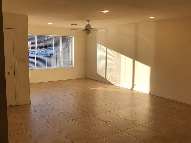 SPACIOUS living area tiled w ceiling fans and LED downlighting. Super Cool w hi-efficiency AC/HP. Full window covers included.
