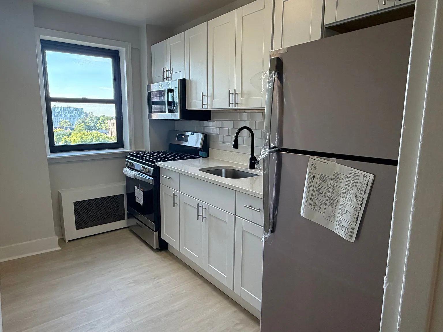 Beautifully Renovated 2-Bedroom - All Utilities Included! — Photo 1