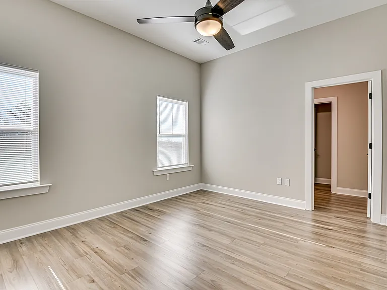 Master bedroom looking into bathroom