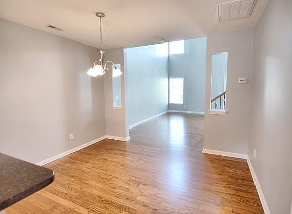 Dining area between kitchen and family room. Half bath is to the right as is washer/dryer closet.