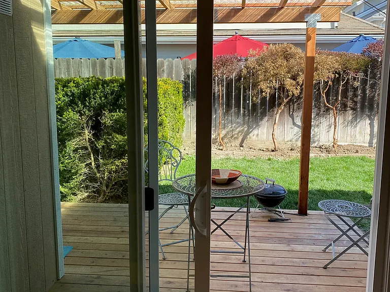 Deck and backyard entrance from bedroom